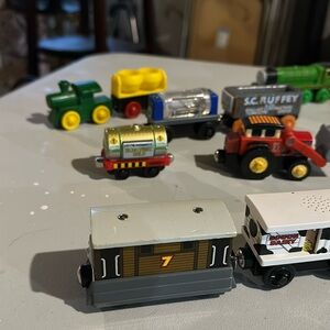 Assorted Thomas and friends engines, cars, and tugboat